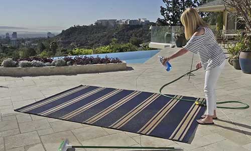 clean outdoor rug with OxiClean